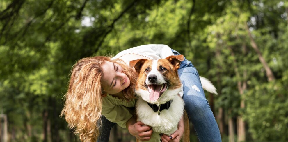 woman-playing-with-her-dog-park